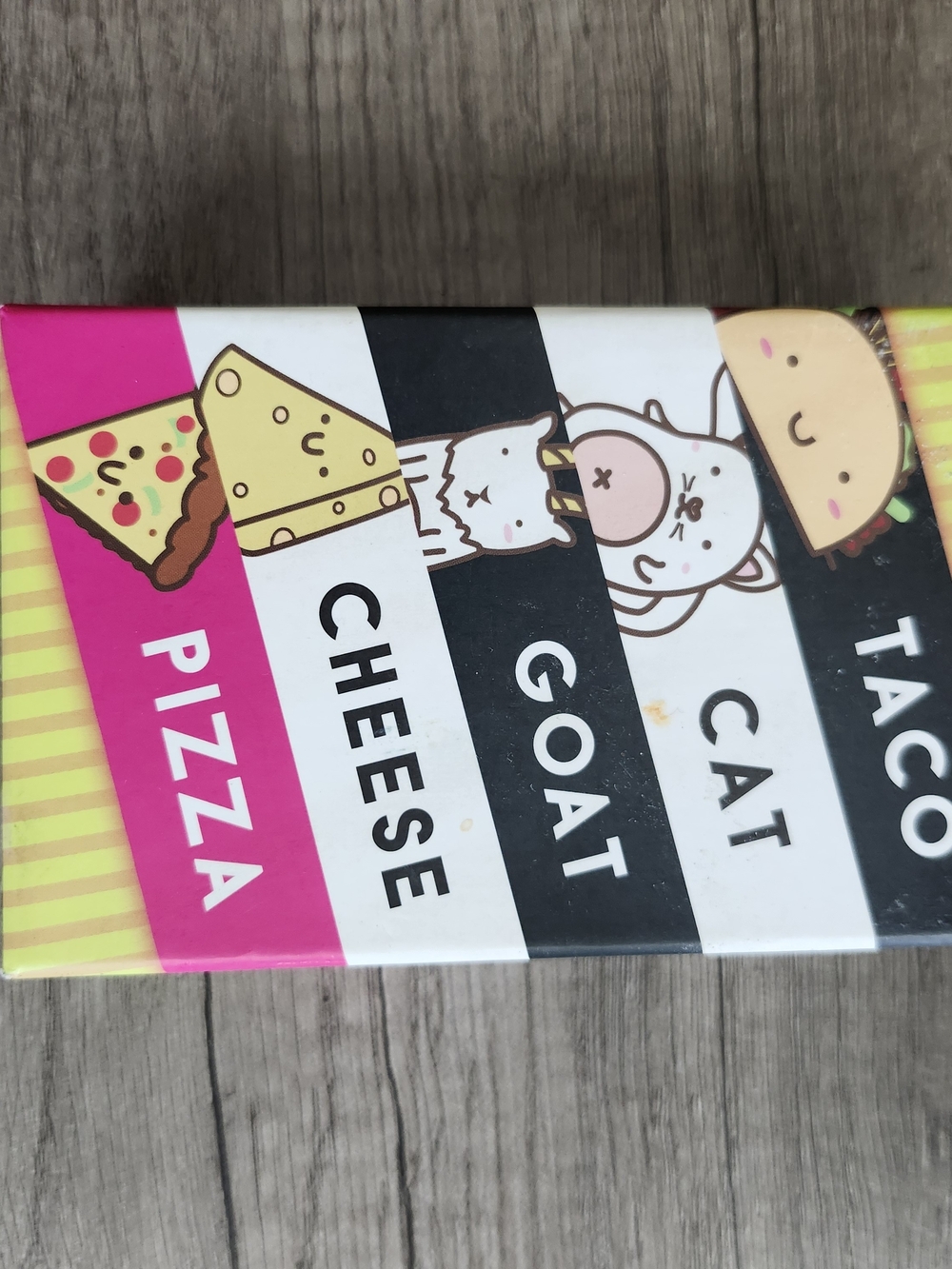 Kids card game "taco, cat, goat, cheese, pizza"